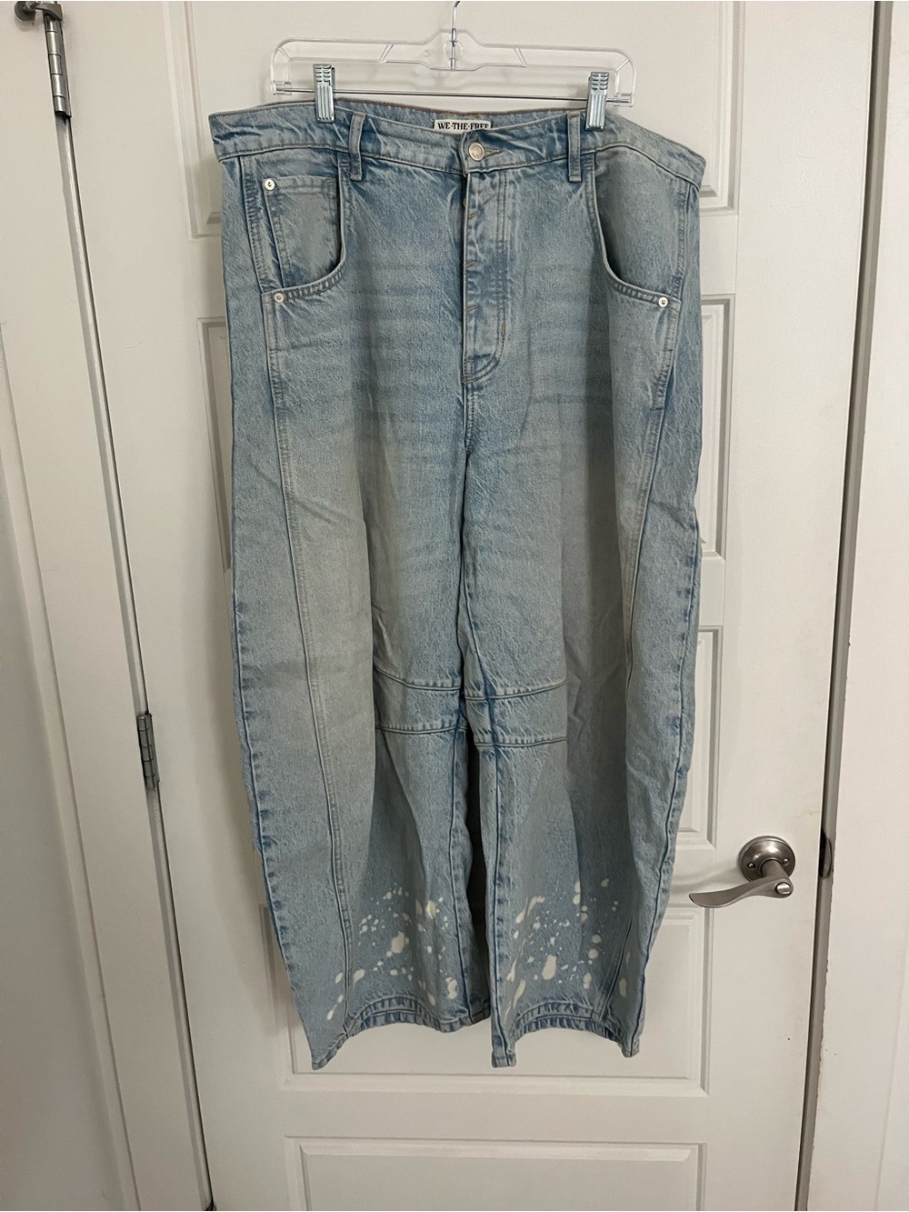 We The Free light blue denim jeans with brown leather label